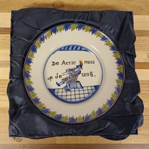 Actie bord met Harlekijn